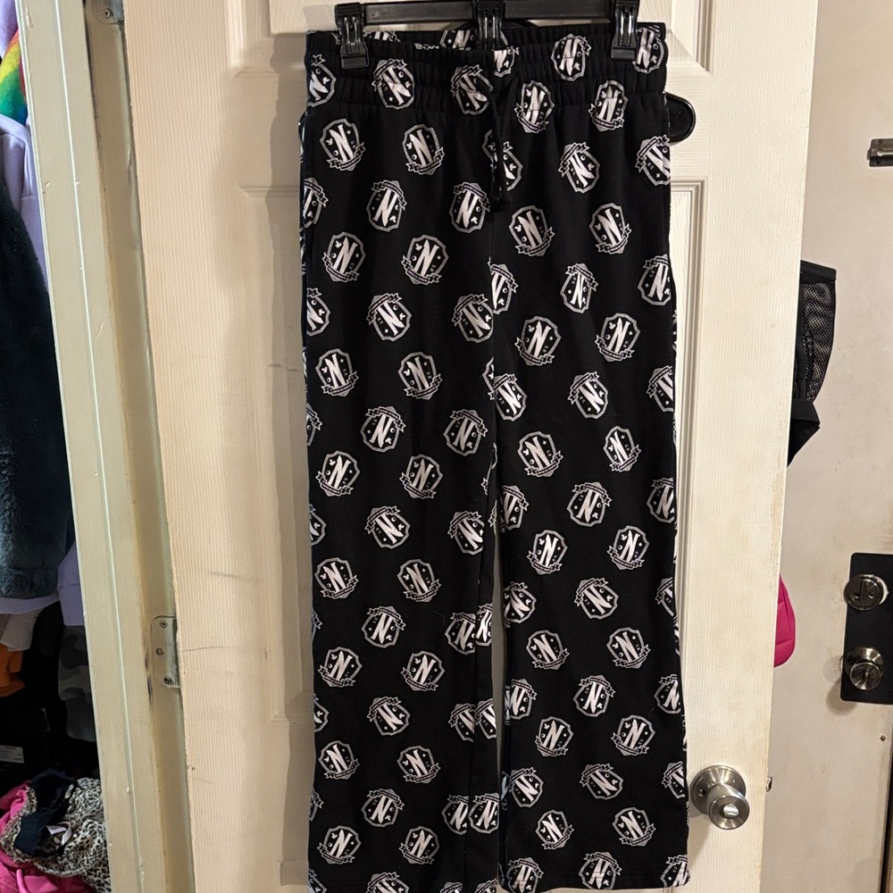 Stylish Black Joggers with White Logo Pattern